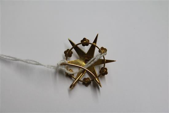 A Victorian 18ct gold, split pearl and diamond set starburst pendant brooch, 28mm.